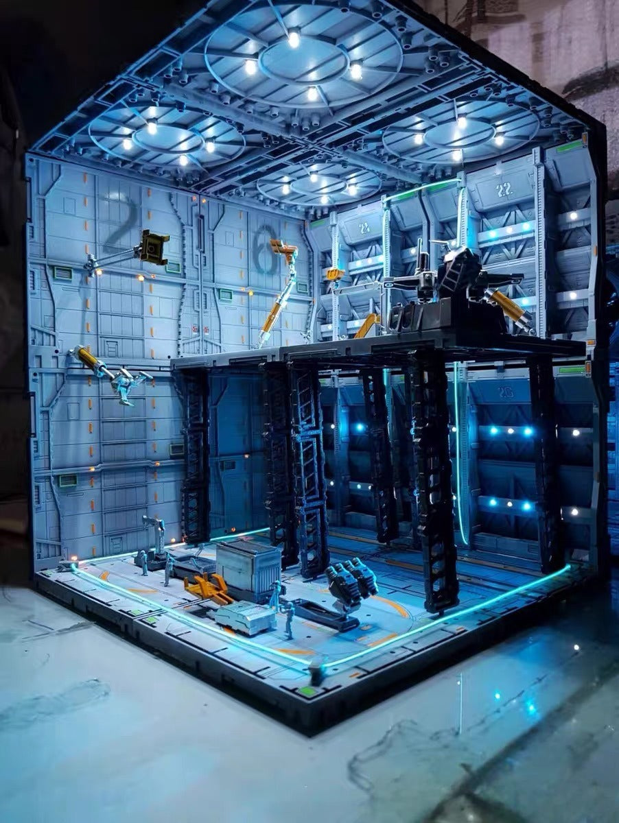 Bespoke illuminated hangar base designed for mechanical action figures.